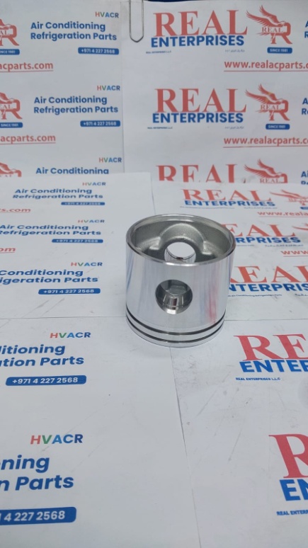 Piston & Pin Assembly (Piston, Wrist Pin, and Retaining Clips).